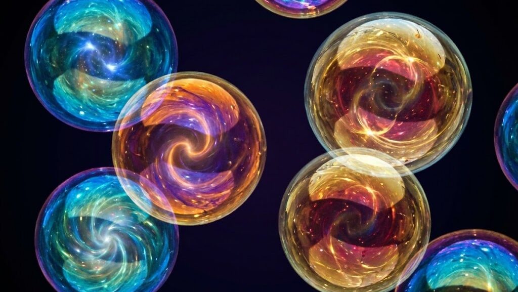 暗い空間に複数の光の球が浮かぶ抽象表現。多元宇宙（マルチバース）のイメージ。