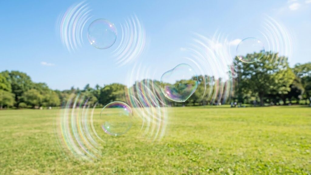 ドップラー効果の基本原理をイメージした音の波が広がる実写風ビジュアル