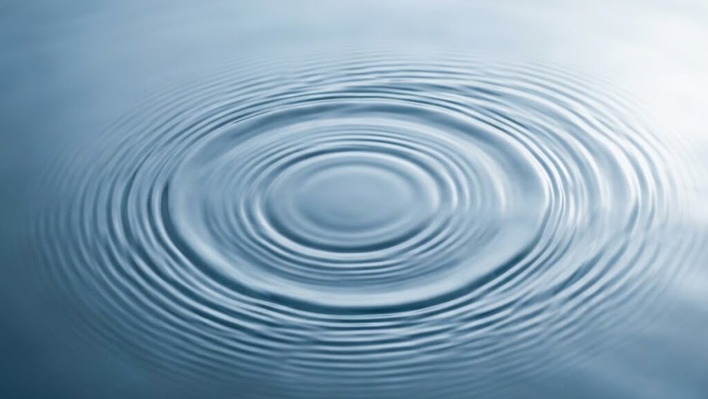 東日本大震災が引き起こした誘発地震の連鎖を水面の波紋で表現したイメージ